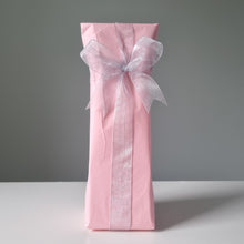 Load image into Gallery viewer, Gift Wrapping - pink tissue paper with sliver ribbon tied into a bow
